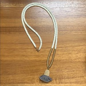 Beaded tassel necklace.